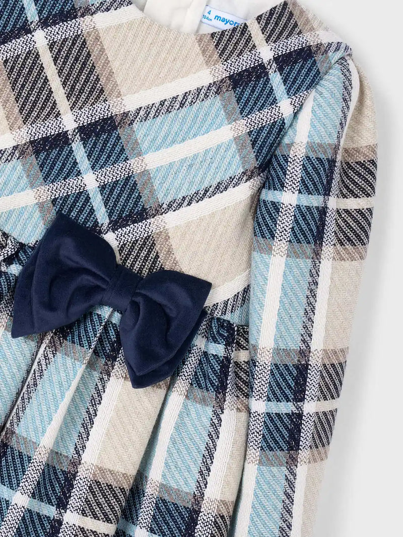 Mayoral plaid dress with navy bow at the waist.