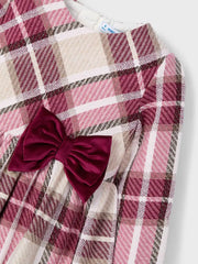 Mayoral plaid dress with burgundy bow at the waist.