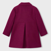 Back of the Mayoral pink pleated coat.