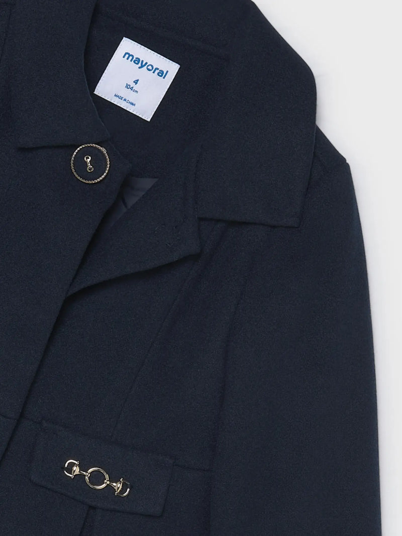 Closer look at the Mayoral pleated coat.