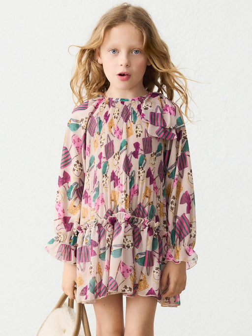Girl modelling the Mayoral pleated dress.