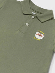 Closer view of the Mayoral polo shirt.