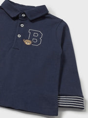 Closer view of the Mayoral long sleeve polo shirt.