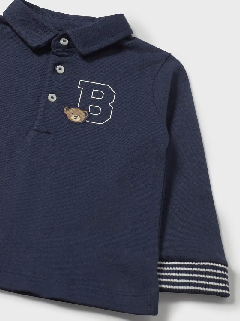 Closer view of the Mayoral long sleeve polo shirt.