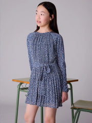 Girl wearing the Mayoral printed dress.