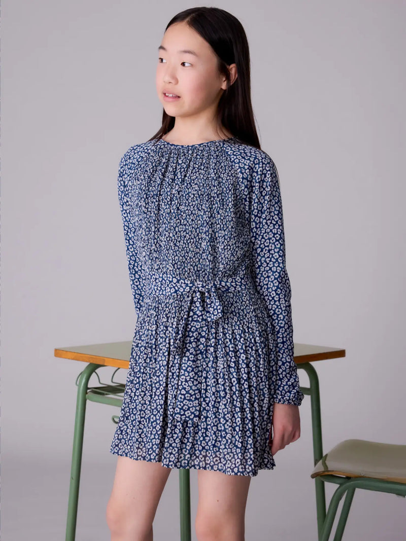 Girl wearing the Mayoral printed dress.