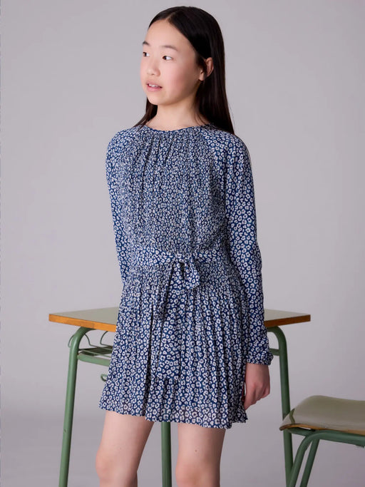 Girl wearing the Mayoral printed dress.