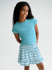 Girl wearing the Mayoral printed skirt set.