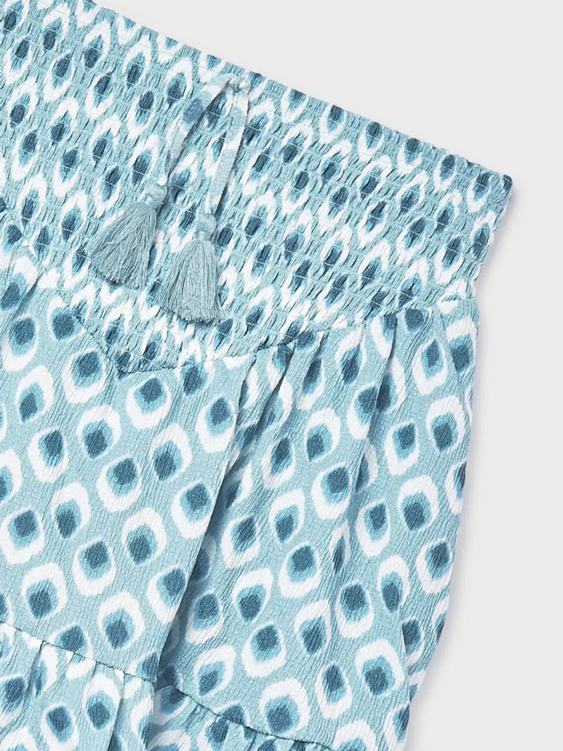 Printed skirt with tassels on the front.