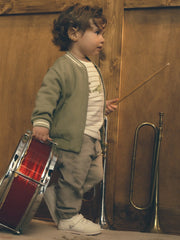 Baby boy wearing the Mayoral pull up trousers.