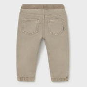 Back of the Mayoral beige pull up trousers.