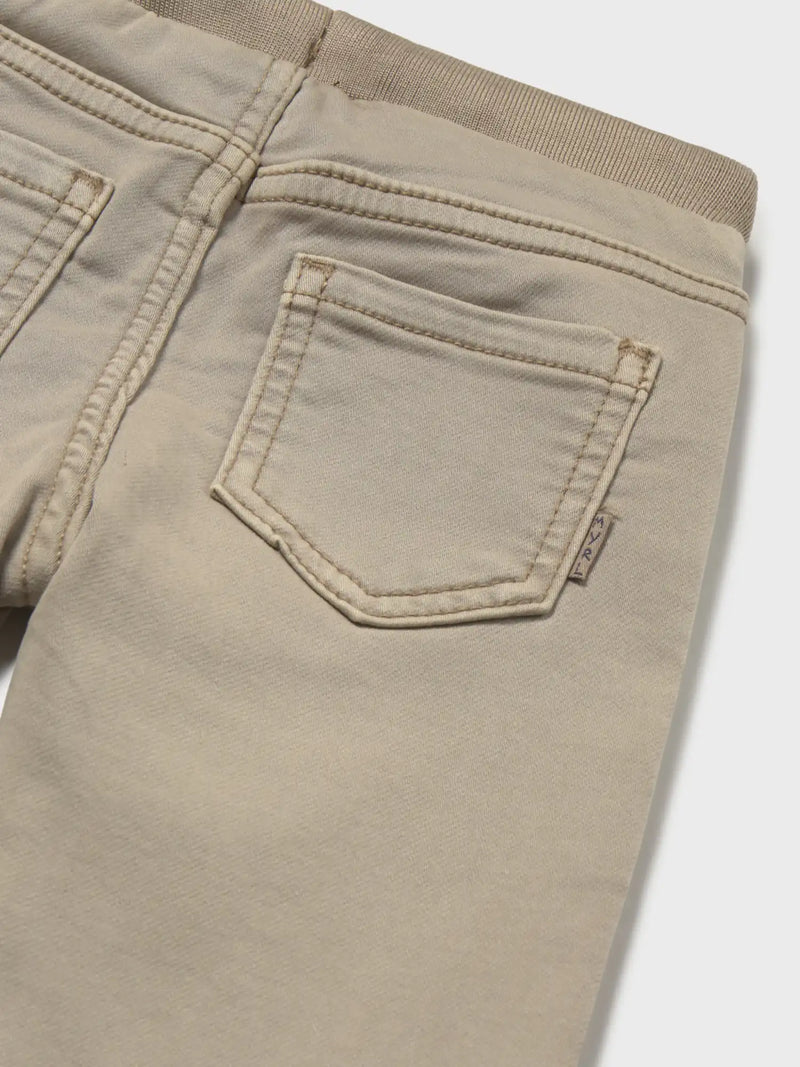 Closer view of the Mayoral pull up trousers.