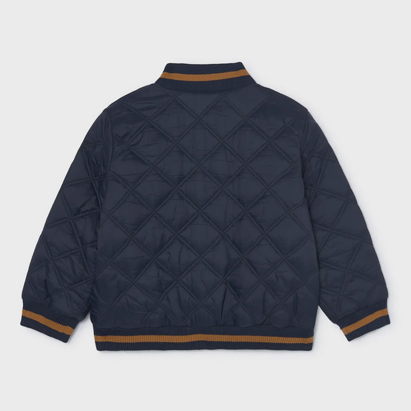 Rear view of the Mayoral navy quilted jacket.