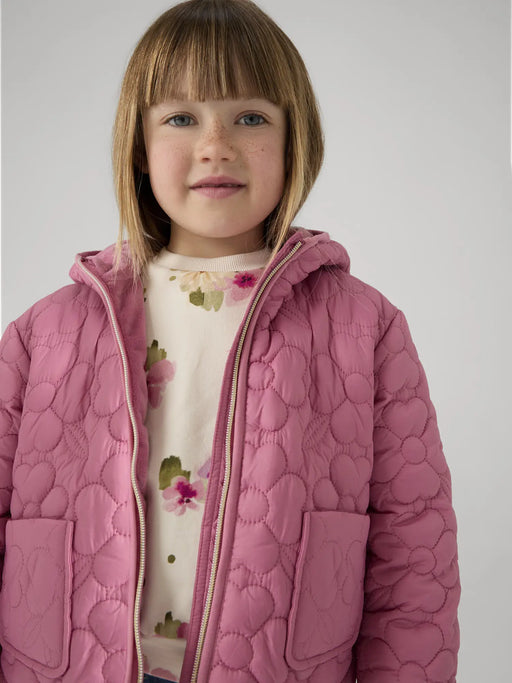 Girl wearing the Mayoral quilted jacket.