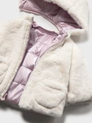 Closer view of the Mayoral reversible coat.