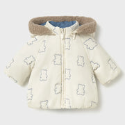 Cream white side of the Mayoral reversible coat.
