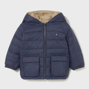 Navy side of the Mayoral reversible coat.