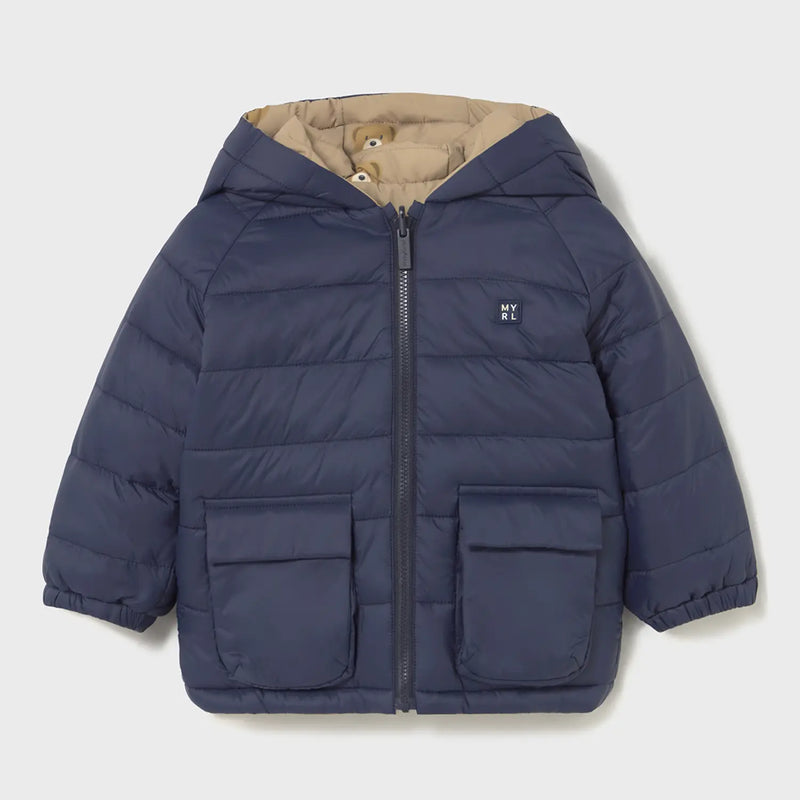 Navy side of the Mayoral reversible coat.