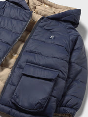 Closer view of the Mayoral reversible coat.