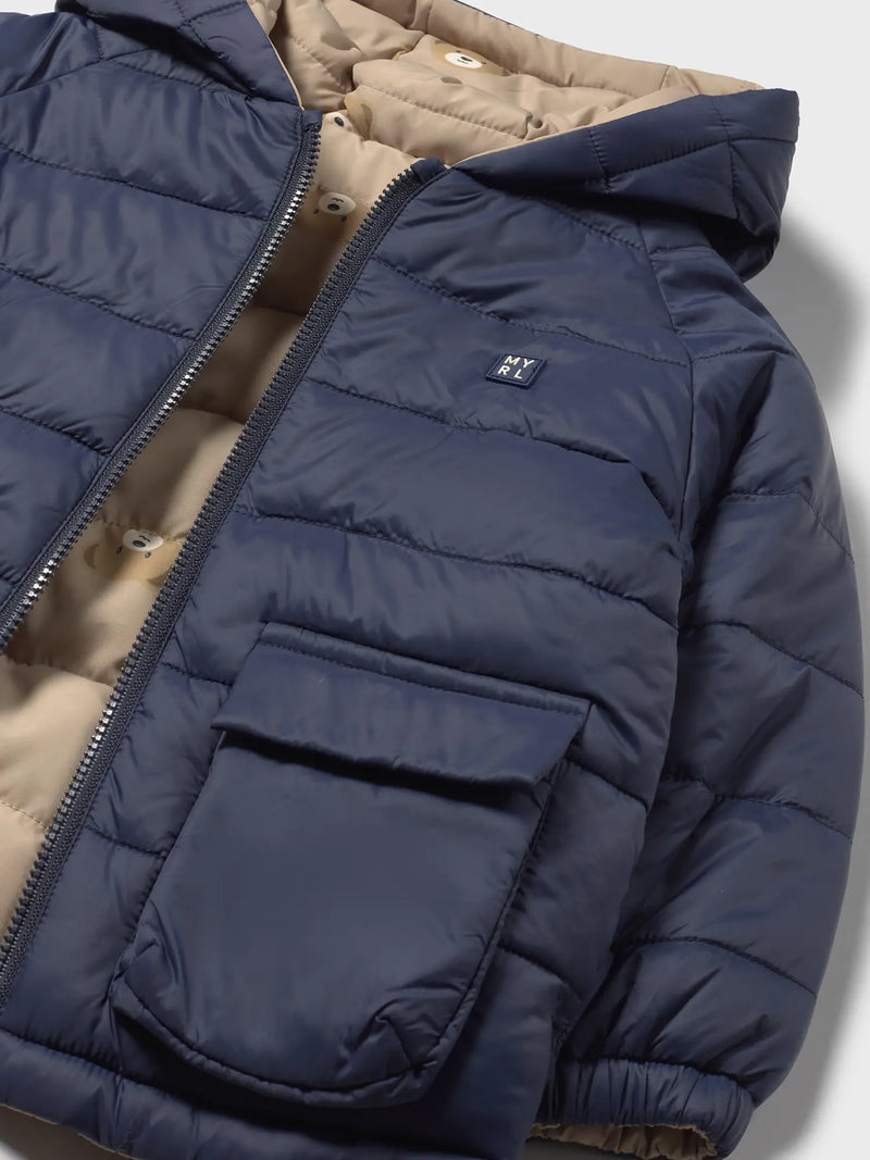 Closer view of the Mayoral reversible coat.