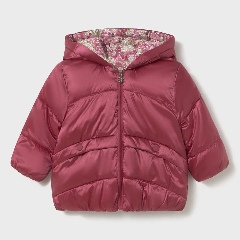 Rose pink side of the baby girl's reversible coat.