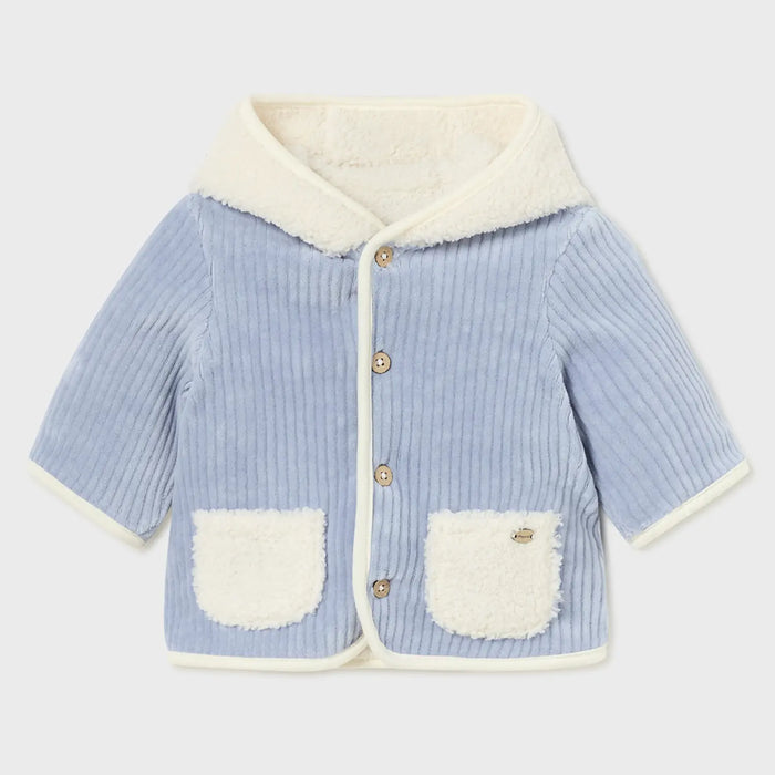 Sky blue side of the baby boy's reversible coat.