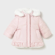 Closer look at the Mayoral reversible faux fur coat showing detail of the pink side.