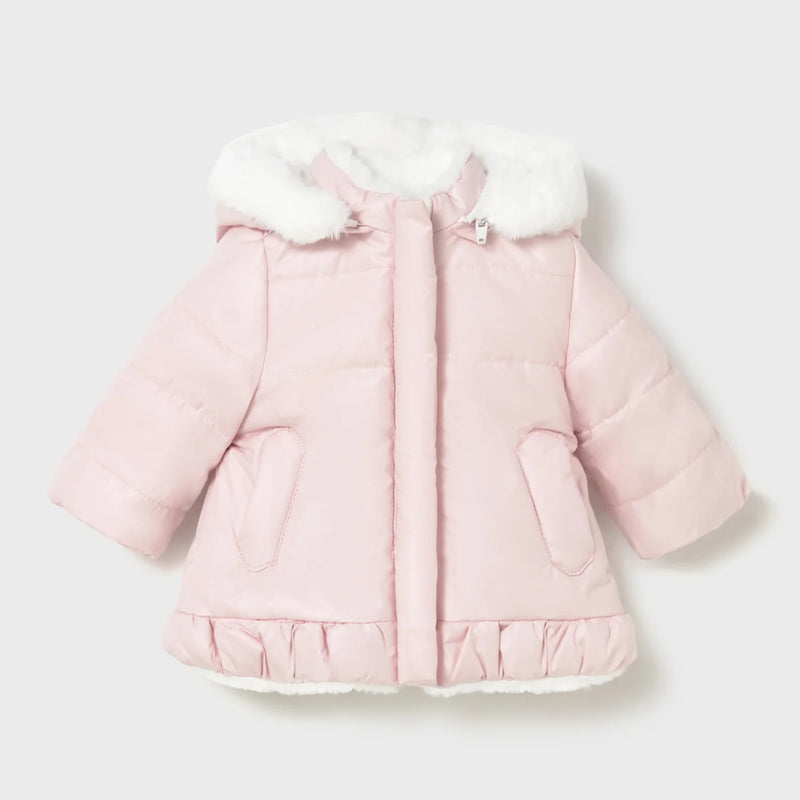 Closer look at the Mayoral reversible faux fur coat showing detail of the pink side.