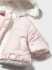 Closer view of the Mayoral reversible faux fur coat.