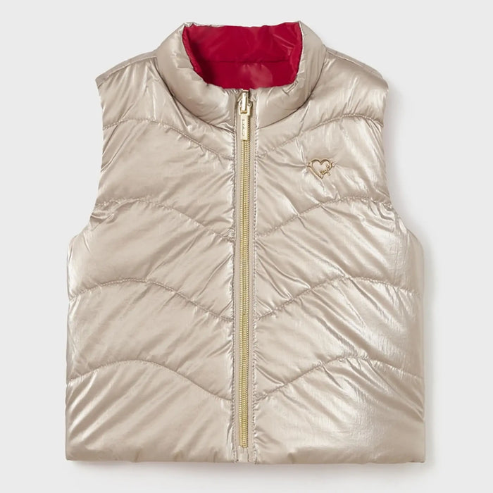 Metallic gold side of the Mayoral reversible gilet.