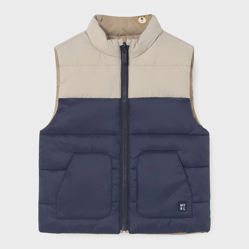 Navy and beige side of the Mayoral reversible gilet.
