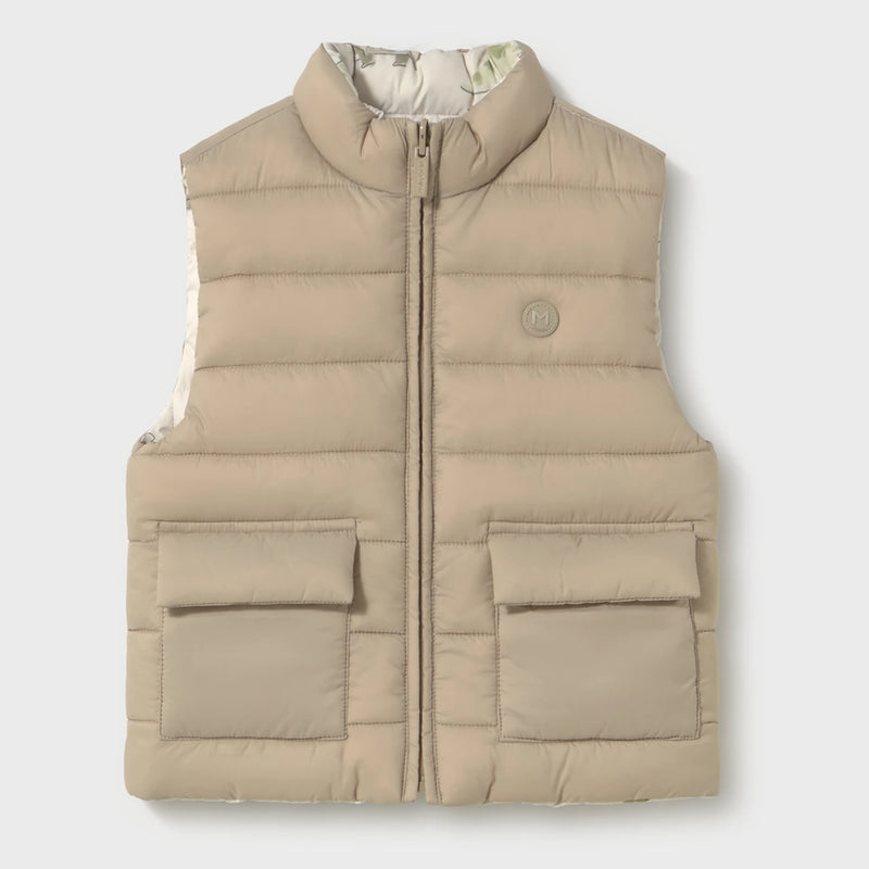 Beige side of the baby boy's reversible gilet.