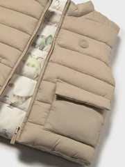 Closer view of the Mayoral reversible gilet.