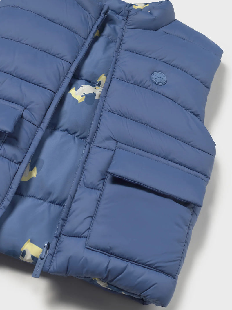 Closer view of the Mayoral reversible gilet.
