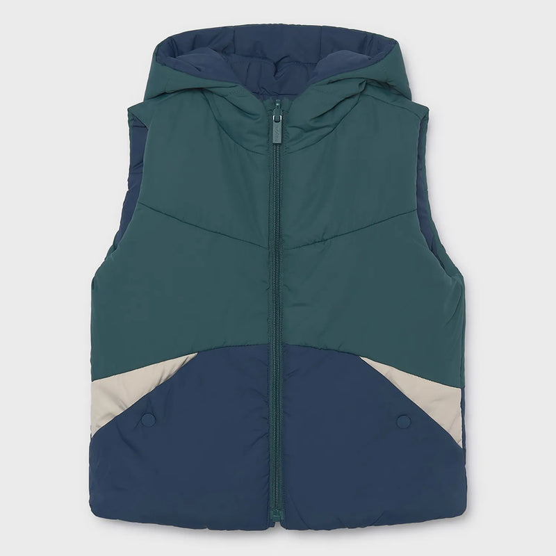 Navy and green colourblock side of the Mayoral reversible gilet.