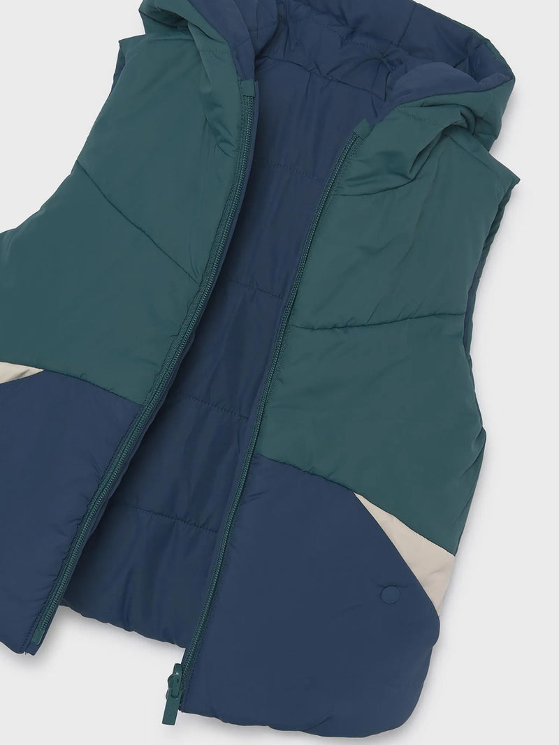 Closer look at the Mayoral reversible gilet.