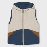 Navy and beige colourblock side of the Mayoral reversible gilet.