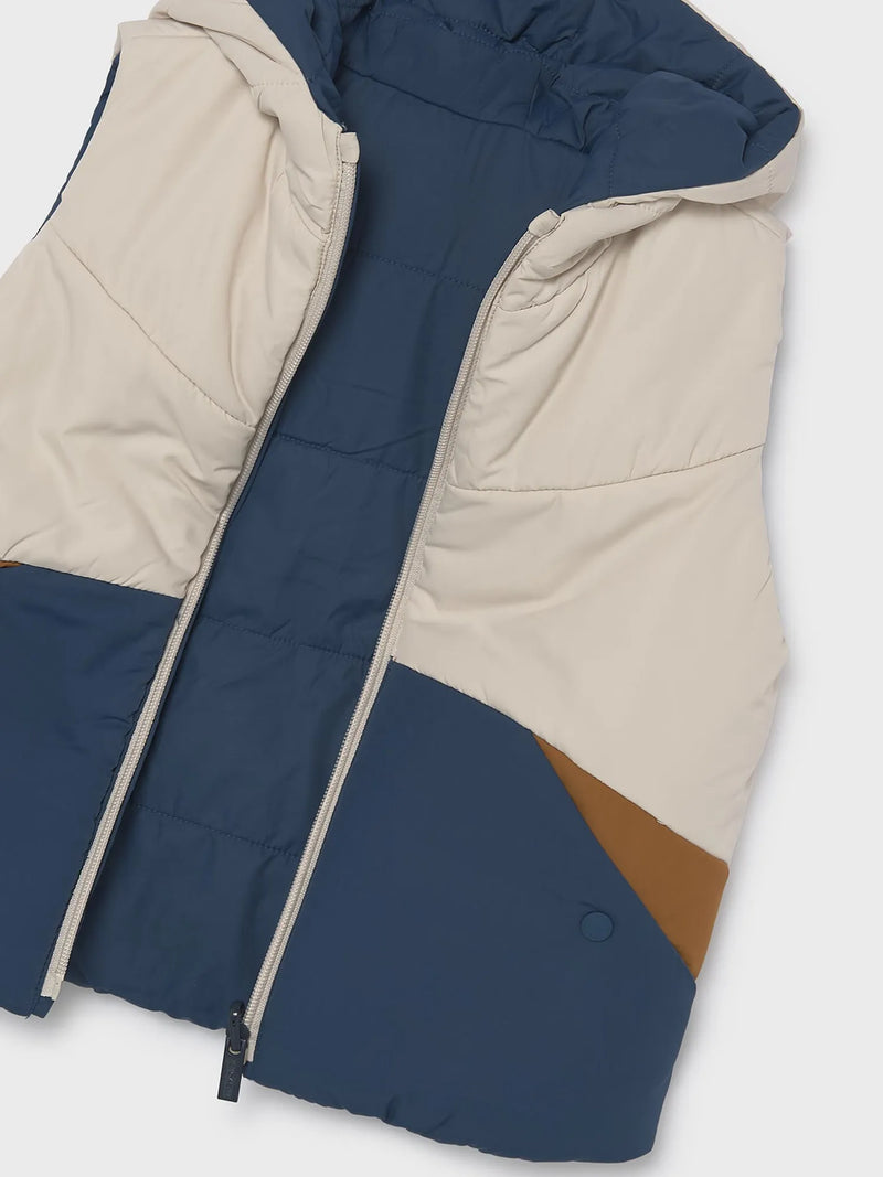 Closer look at the Mayoral reversible gilet.