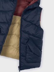 Closer view of the Mayoral reversible gilet.