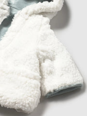 Closer view of the Mayoral reversible sherpa coat.