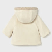 Rear view of the Mayoral reversible shearling coat.