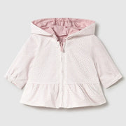 White side with pink spots.