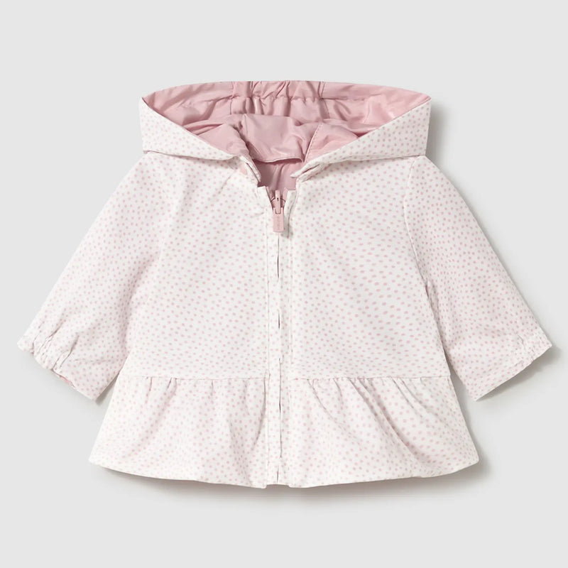 White side with pink spots.