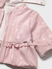Closer view of the pink side of the Mayoral reversible windbreaker.