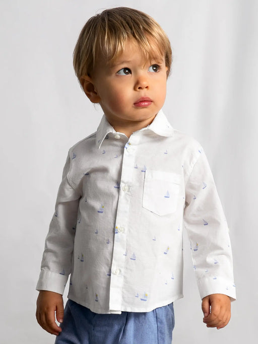 Baby boy wearing the Mayoral sailboat shirt.