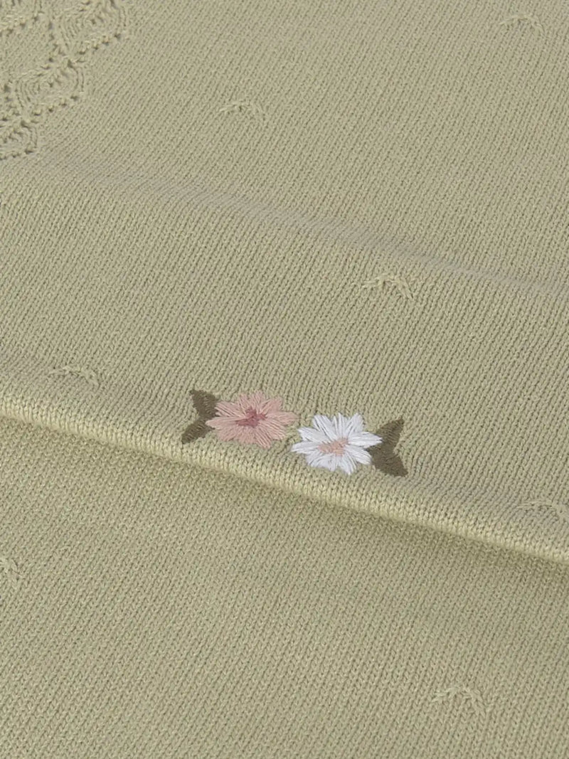 Mayoral shawl with dainty embroidered flowers.