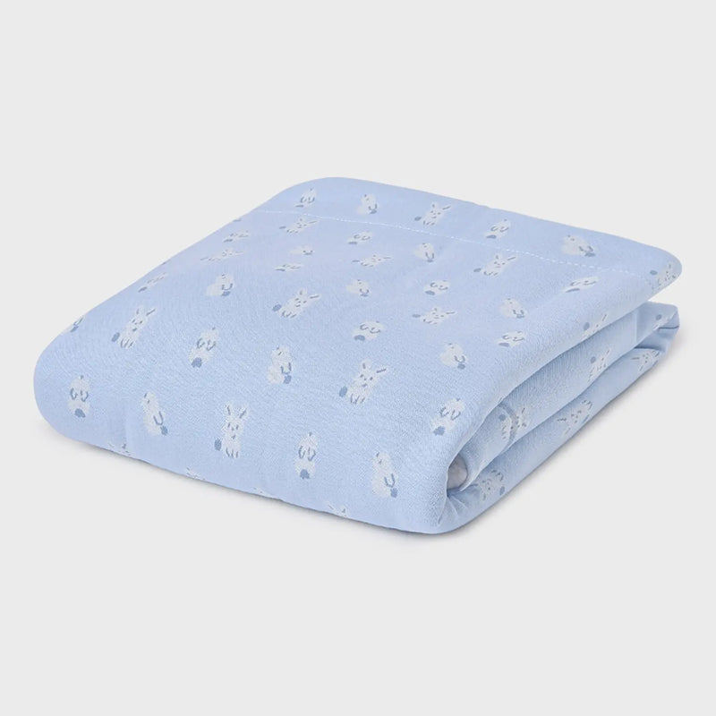 Mayoral blue blanket with bunny rabbit pattern.