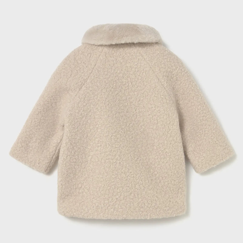 Back of the Mayoral beige shearling coat.