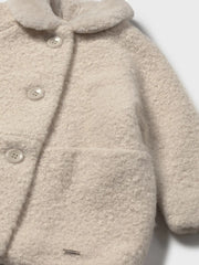 Mayoral shearling coat with faux fur collar.
