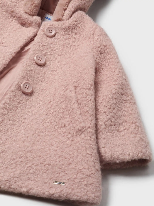 Closer view of the Mayoral shearling coat.